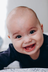 Close-up portrait of a smiling boy