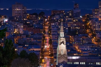 High angle view of illuminated cityscape at night