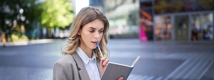 Young woman using mobile phone