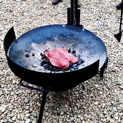 High angle view of meat on barbecue grill