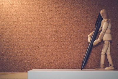 High angle view of figurine on table