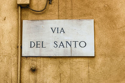 Street sign for via del santo, in the city center of padua, italy