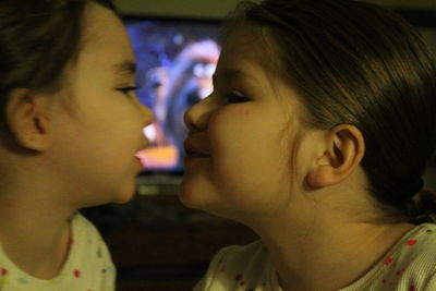 Close-up of mother and daughter