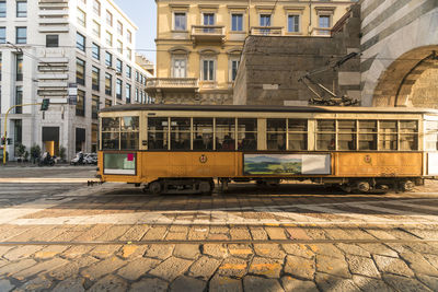 Old tram at archi di porta nuova, alessandro mansioni street in milano