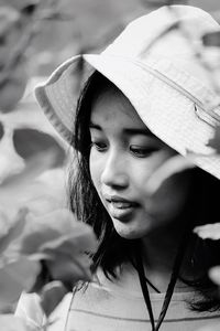 Close-up portrait of girl looking away