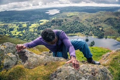 Man climbing on rock