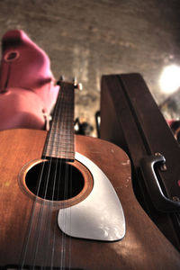 Close-up of hand playing guitar