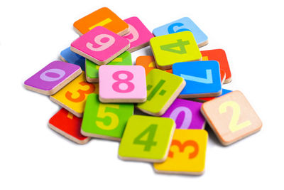 Close-up of toys over white background