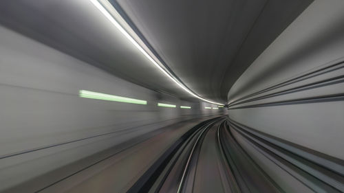 Blurred motion of train in railroad tunnel