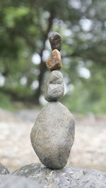 Close-up of stone stack on rock