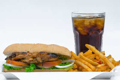 Close-up of food on table against white background