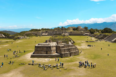 Group of people in front of historical building