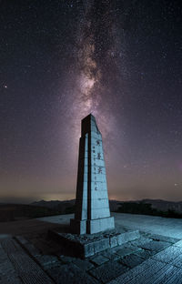 Monument against star field