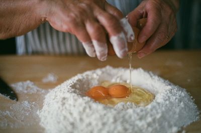 Close-up of person preparing food