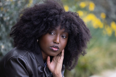 Portrait of young woman looking away