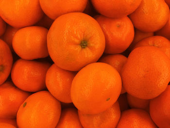 Full frame shot of oranges at market stall