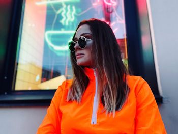 Portrait of young woman in sunglasses