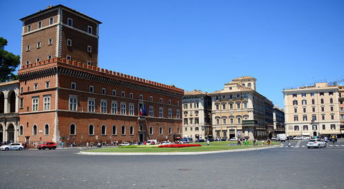 Piazza venezia is a famous square in rome. it is located at the foot of the capitol, 