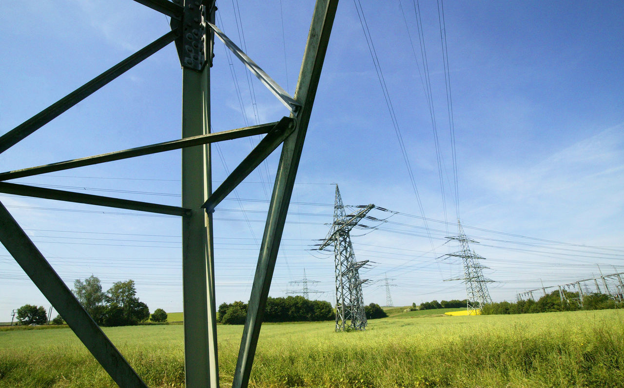 ELECTRICITY PYLON ON FIELD