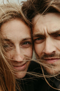 Close-up portrait of young couple