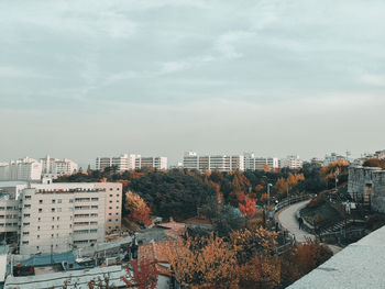 High angle view of buildings against sky