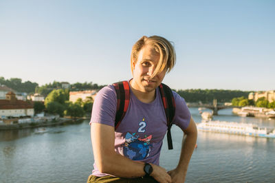 Portrait of smiling young woman in water