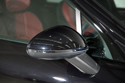 Close-up of vintage car on side-view mirror