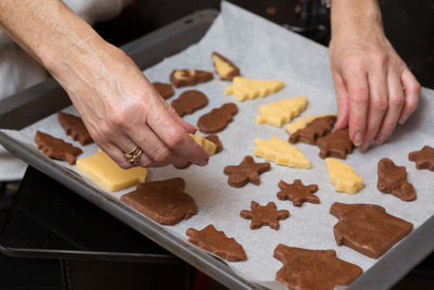 High angle view of person preparing food on table