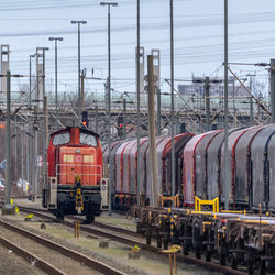 Train on railroad track against sky