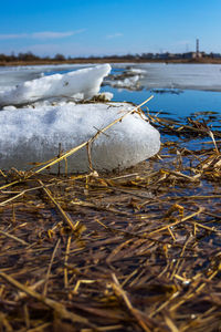 Close-up of ice floating on water