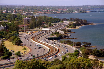 High angle view of vehicles on road in city