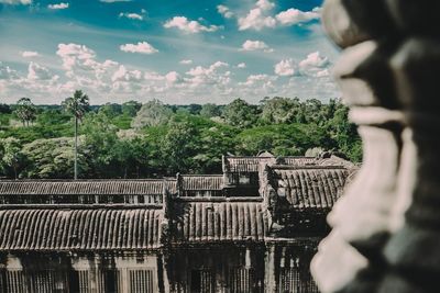 View of temple against building