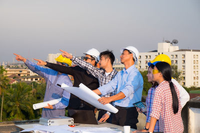 Group of people against the sky