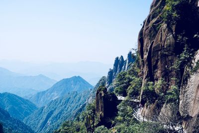 Panoramic view of mountains against clear sky