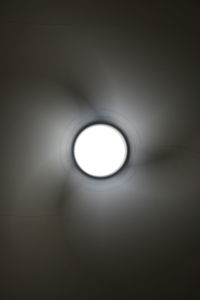 Low angle view of illuminated lamp