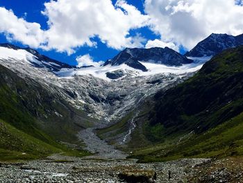 Scenic view of snowcapped mountains against sky