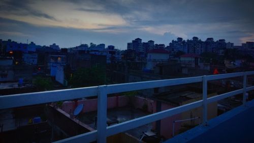 High angle view of buildings against sky at sunset