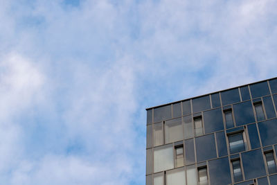 Low angle view of modern building against sky