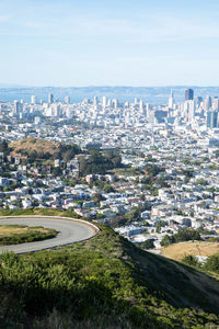 High angle view of road amidst buildings in city
