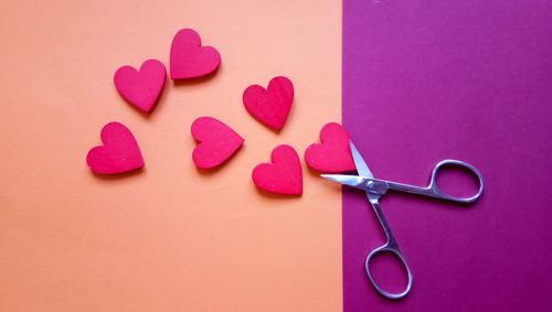 Directly above shot of heart shapes on colored background