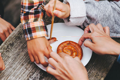 Cropped image of woman holding hands