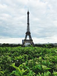 View of tower against cloudy sky