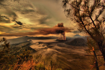 Panoramic view of volcanic landscape against sky during sunset