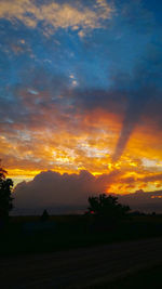 Scenic view of silhouette landscape against sky during sunset