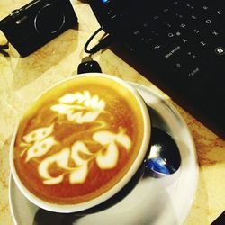 Close-up of coffee cup on table