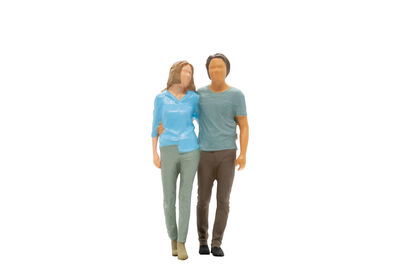 Full length of a couple against white background