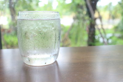 Close-up of water in glass on table