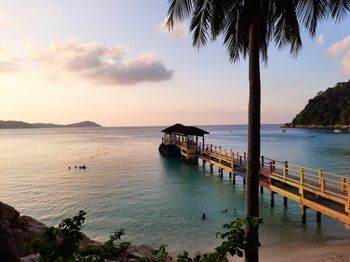 Scenic view of sea against sky at sunset