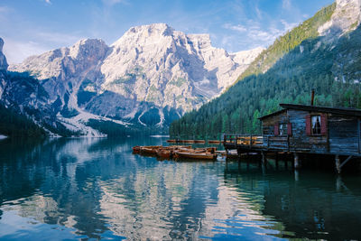 Scenic view of lake and mountains against sky