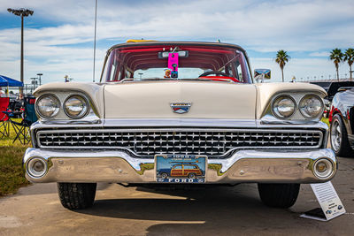 View of vintage car against cloudy sky